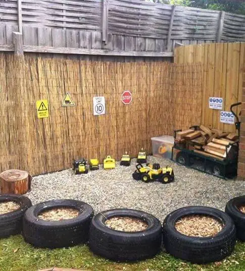 A Backyard with Tyre Play Area