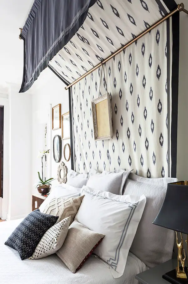 Use a thick patterned fabric to make a canopy so you can also use it as a headboard