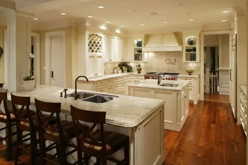 White kitchen with island and peninsula