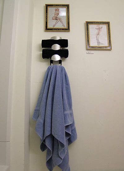 Place your towels in a wine holder, great!