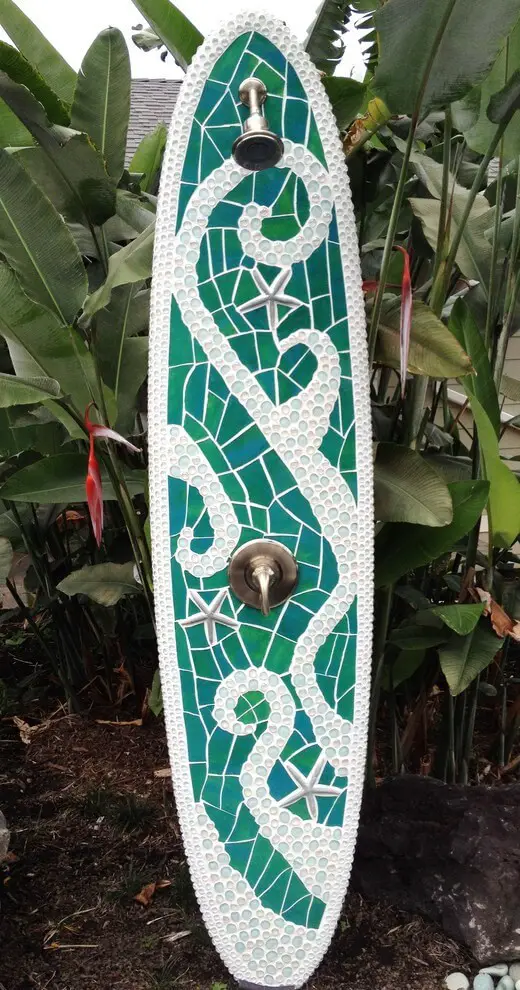 Outdoor shower from longboard and starfishes