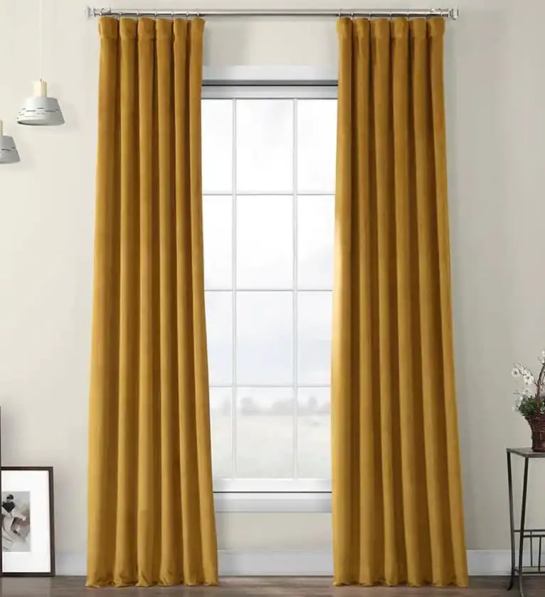 Gold curtains go best with green walls