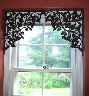 Shelf brackets to windows to create architectural interest