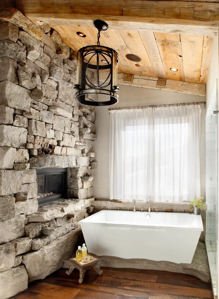 Rustic bathroom with stone walls