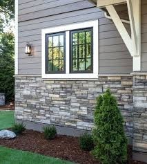 Faux stone exterior window trim