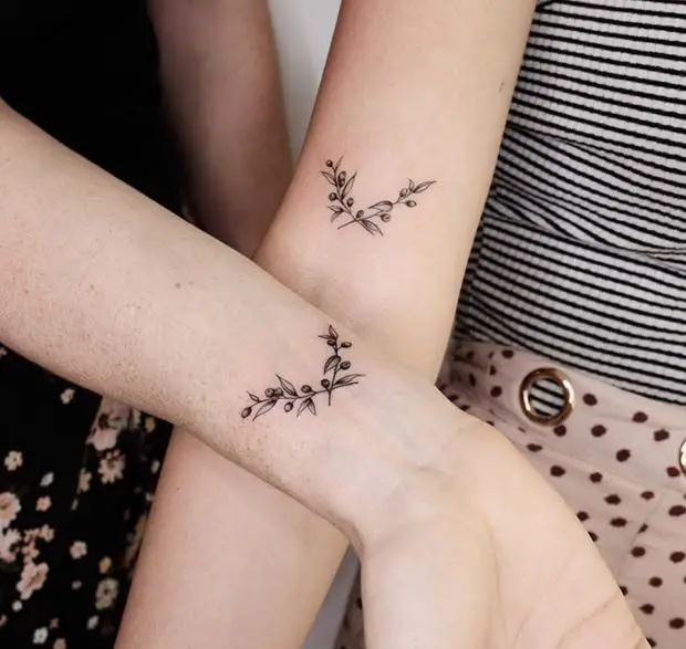 #7. The matching olive branch tattoo.