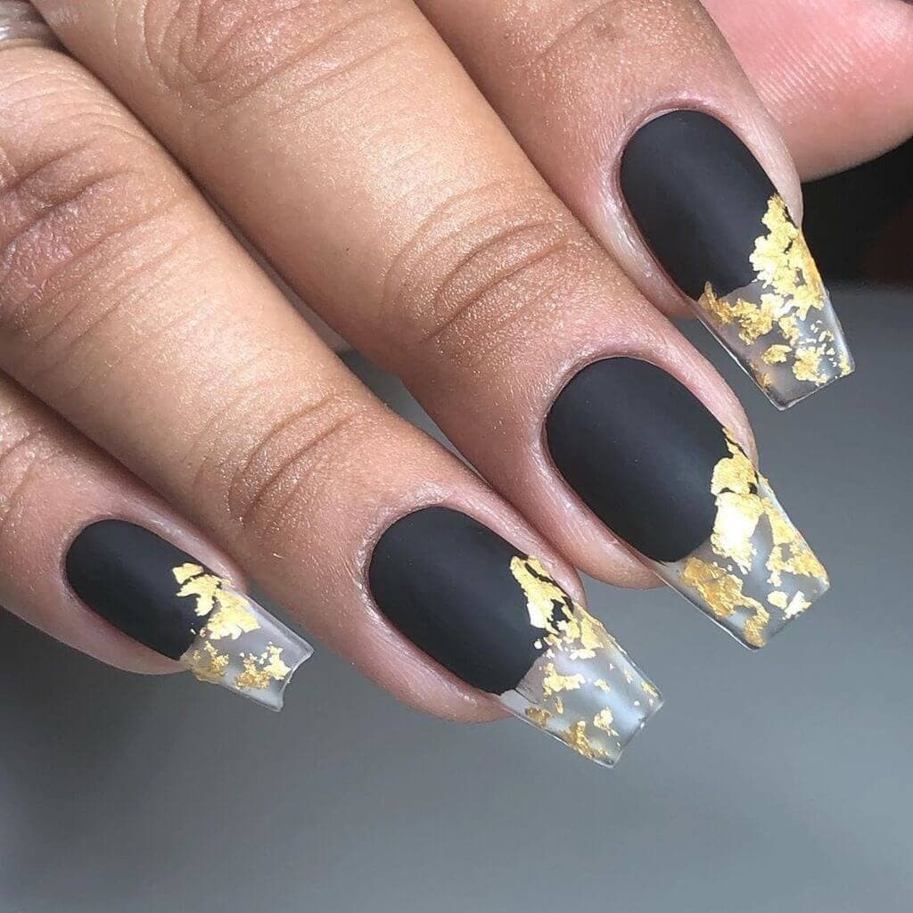 Black nails with gold details