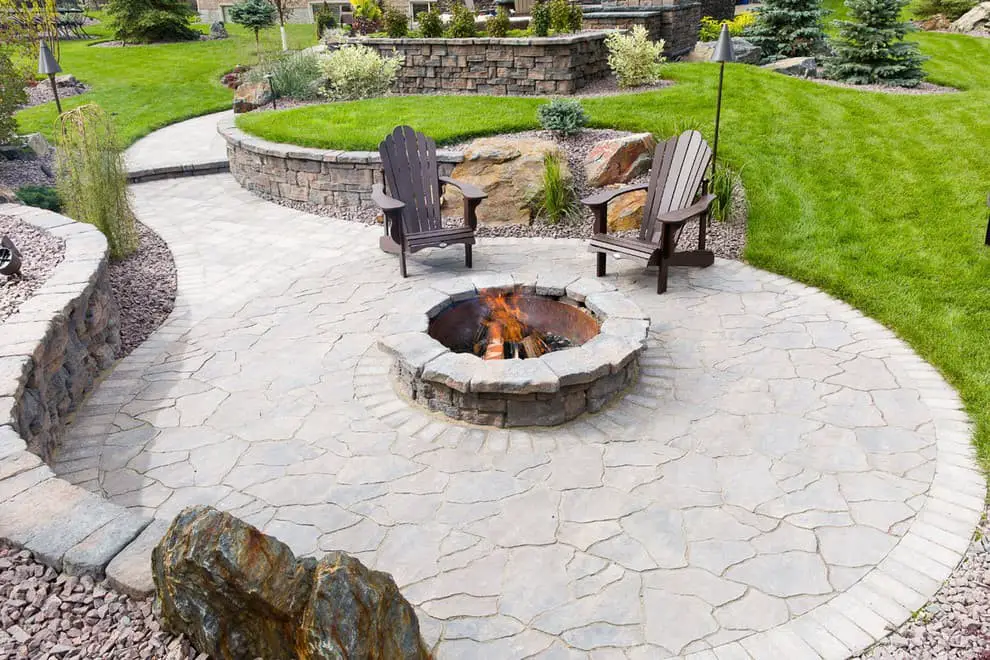 Flagstone patio ideas with a fire pit.