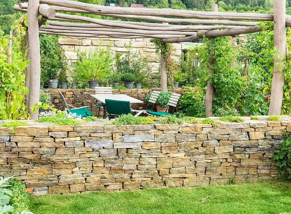 Backyard Oasis With Stone Walls