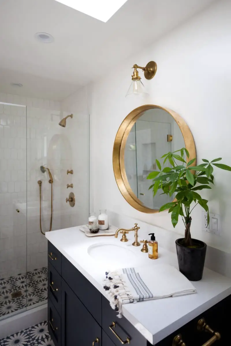 Bathroom lighting ideas over round mirror.