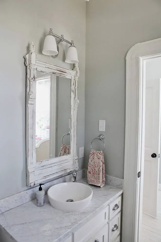 Farmhouse bathroom with a rustic mirror