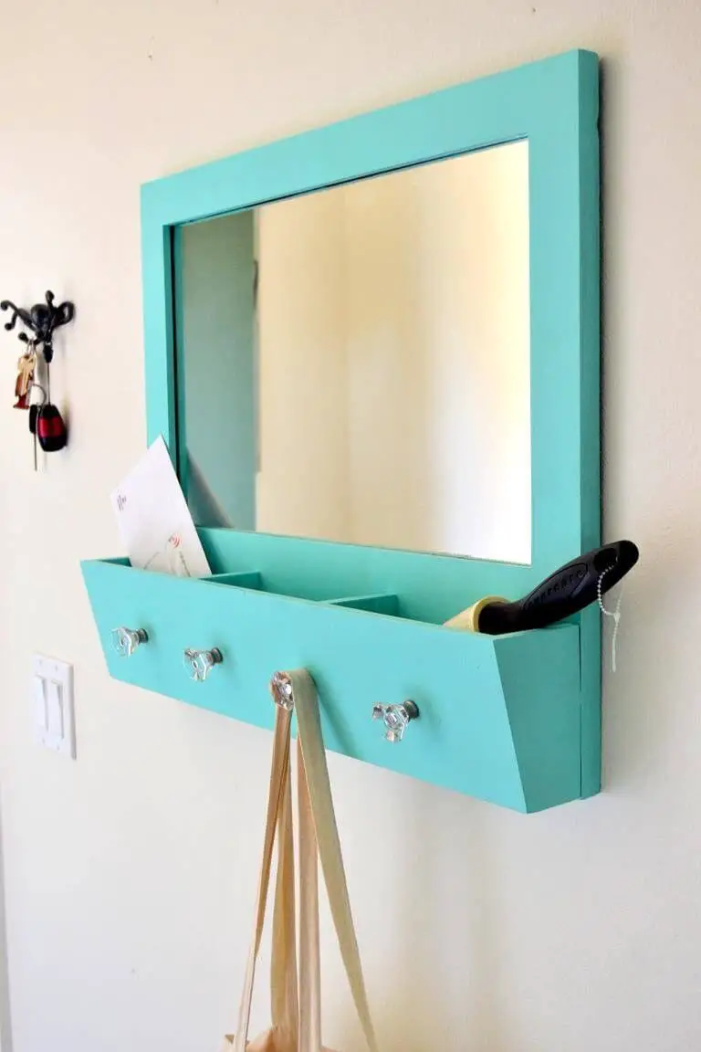 Mirror with key holder