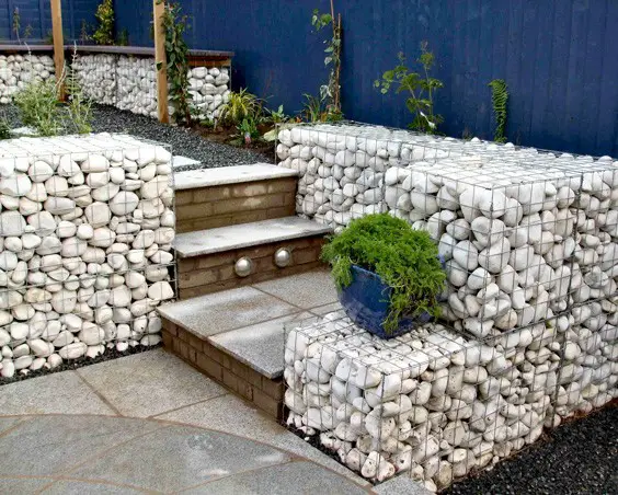 Gabion baskets and white cobbles