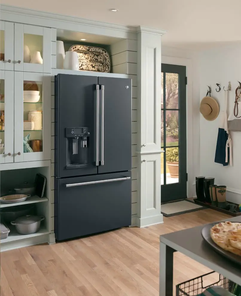 Dark slate appliances + White cabinets.