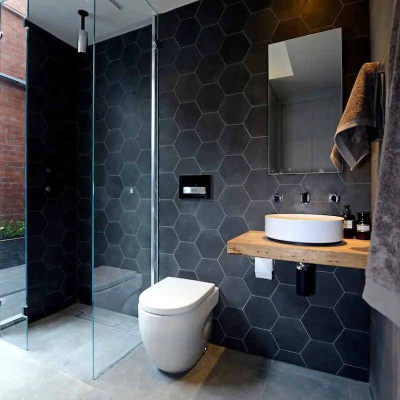 #6. Moody bathroom with hexagonal tiles and round basin