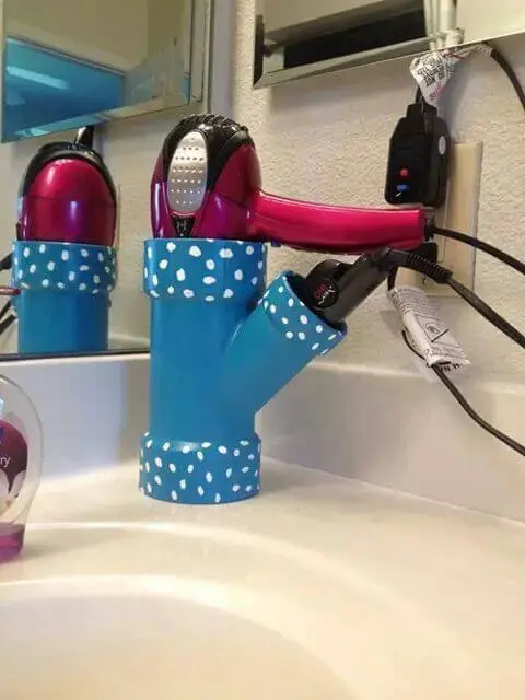 PVC pipe painted and used as hair dryer holder