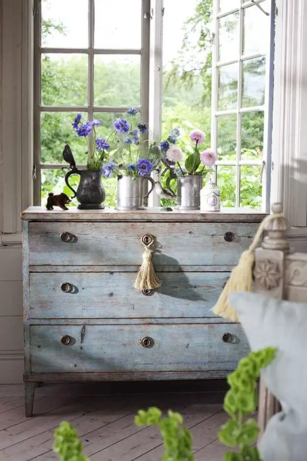 #12. Reclaimed Wood Dresser with Flowers