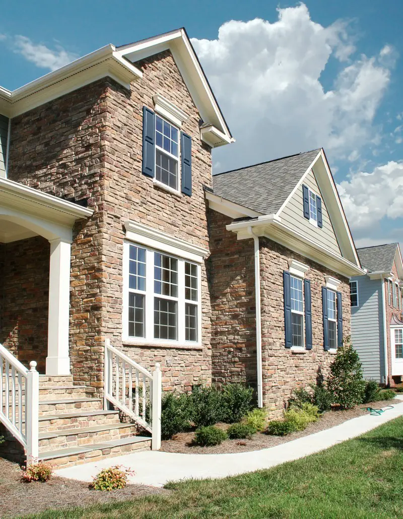 Faux stone exterior window trim