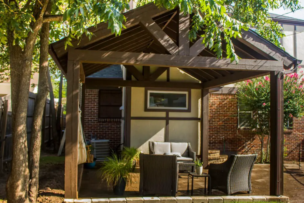 #23. Wooden Backyard Pavilion with a Brick Paver Patio