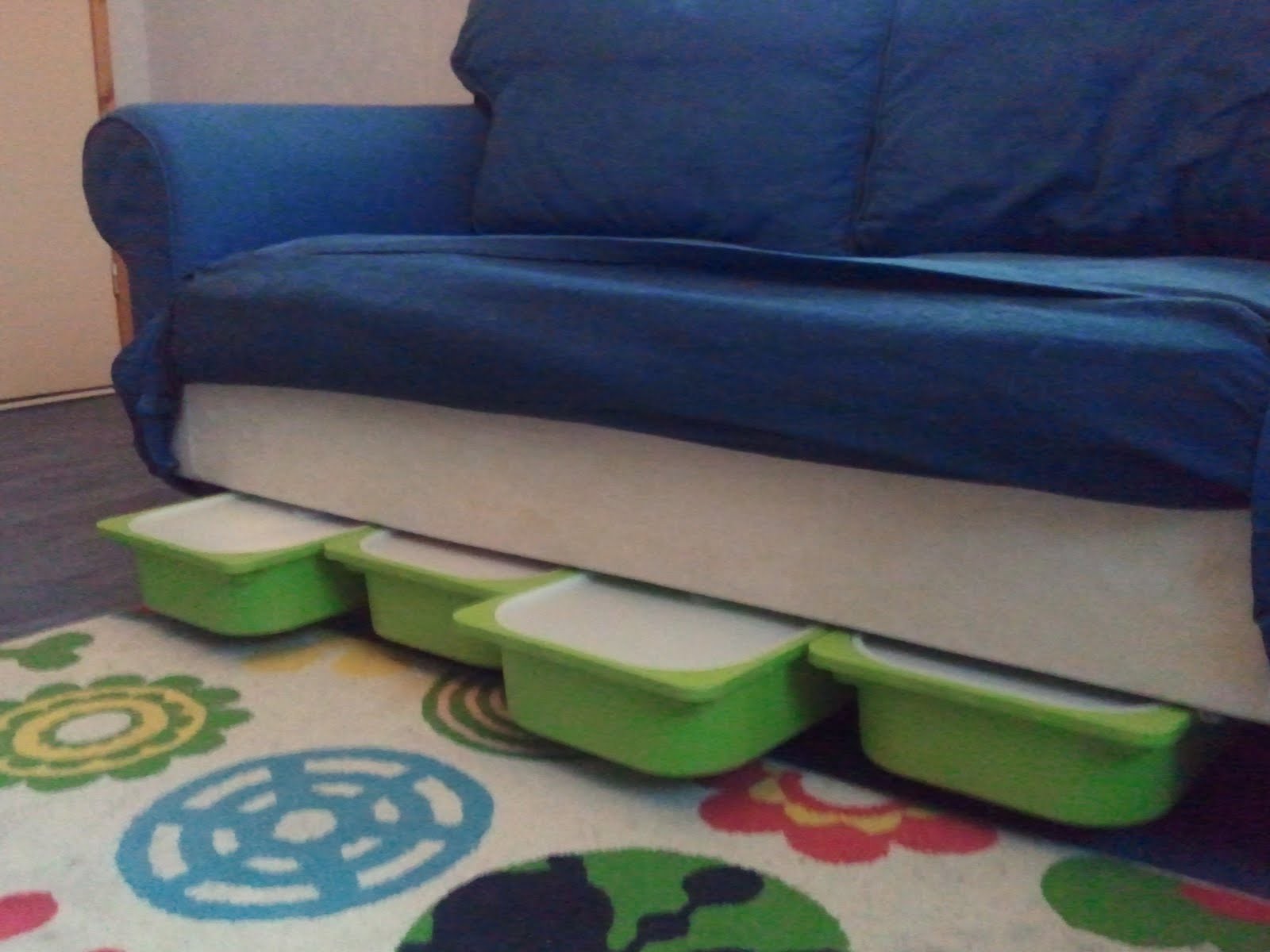 Create sliding boxes to store toys and place them under the sofa