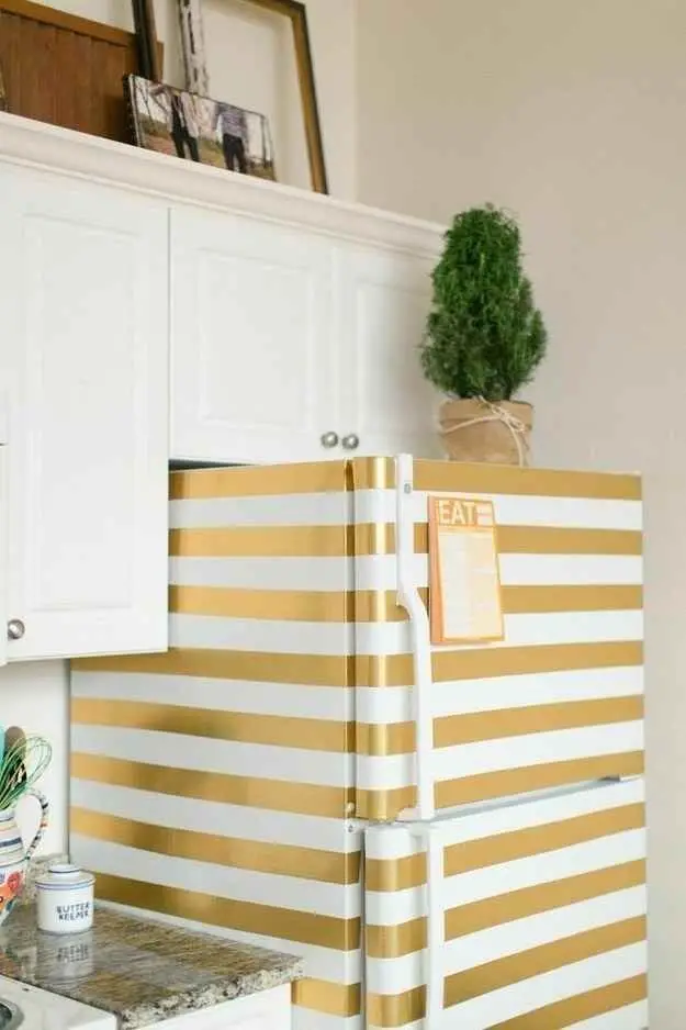 Gold and white fridge