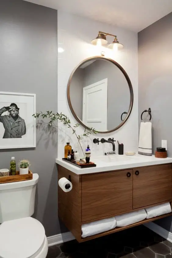 Bathroom lighting ideas over round mirror.