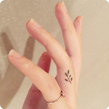 #8. The small olive branch tattoo.