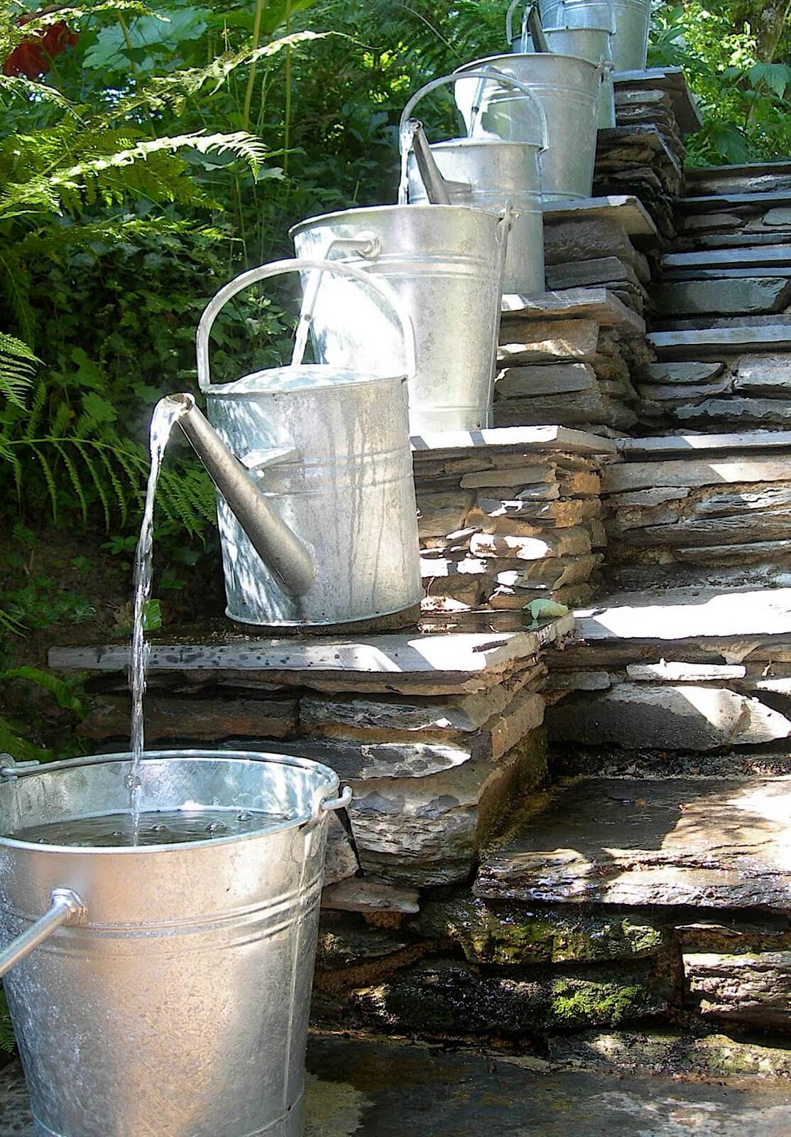 Unique Water feature with watering cans