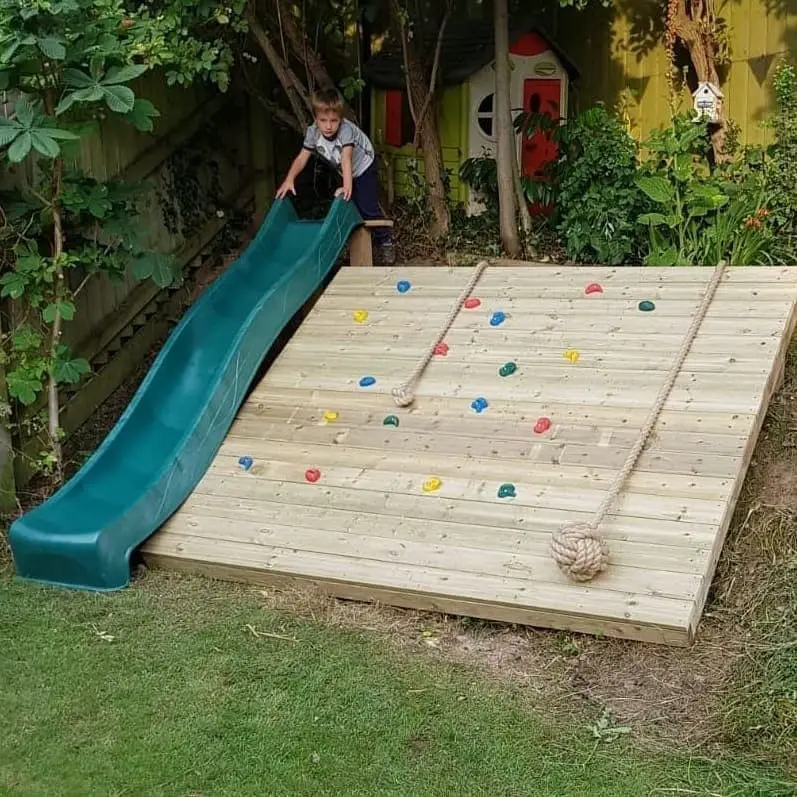 Climbing on a Slanted Rock with a Slide