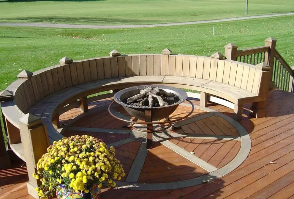 Curved deck and a raised fire pit