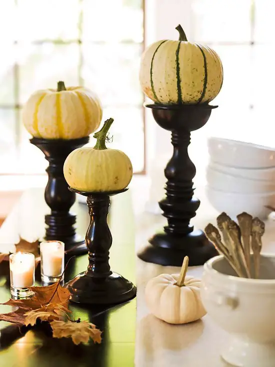 Pumpkin on a candle holder