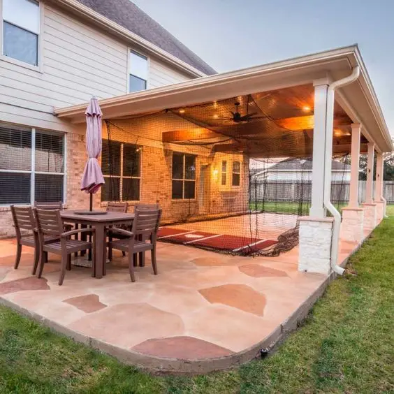 #3. Stamped Concrete Patio With Pergola