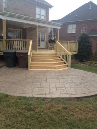 #7. Stamped concrete patio with deck