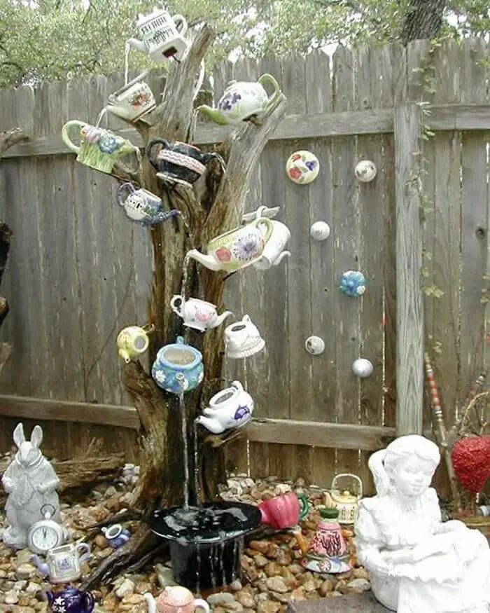 Fountain From A Tree Stump and Recycled Tea Pots