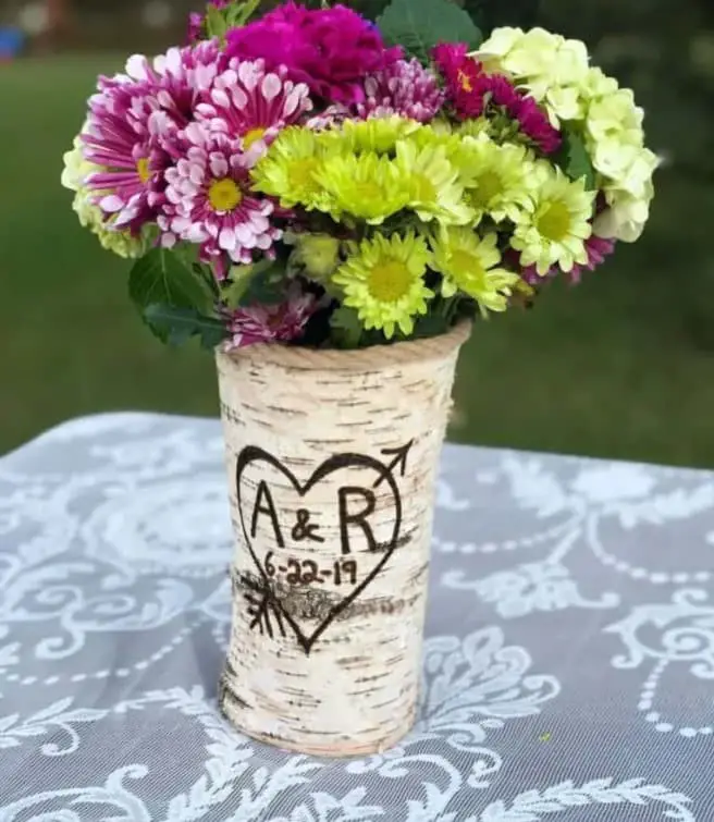 Wood burnt wedding centerpiece