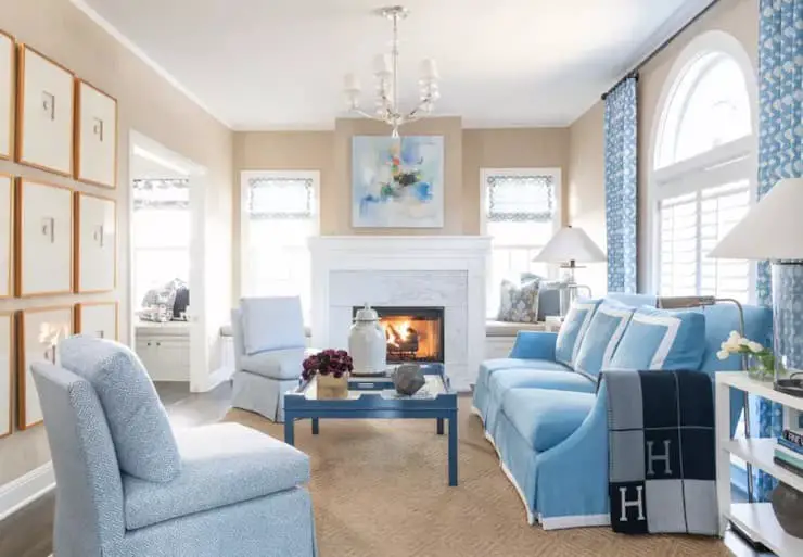 Calming blue couch living room with fireplace