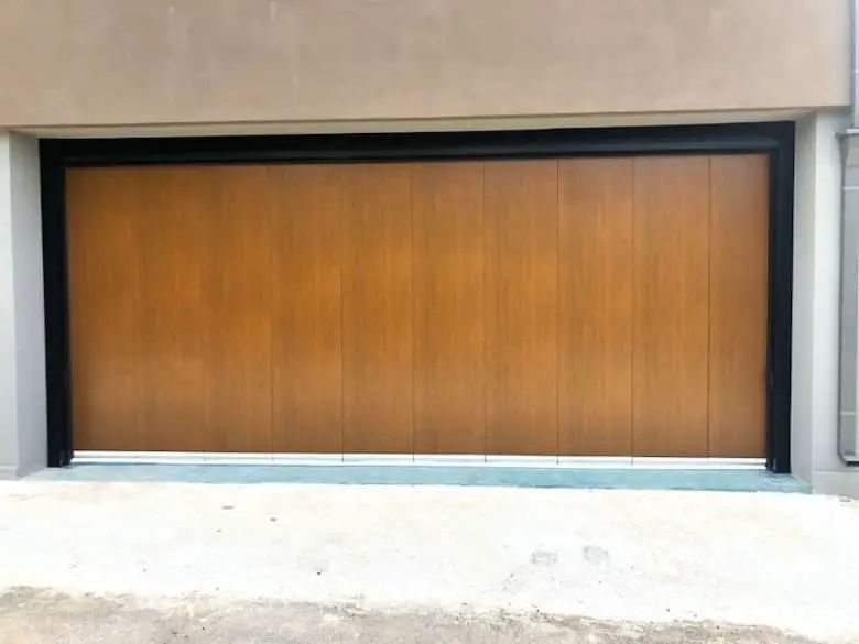 Side-sliding garage doors