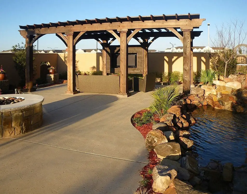 Backyard Oasis With Large Arbor and Fountains