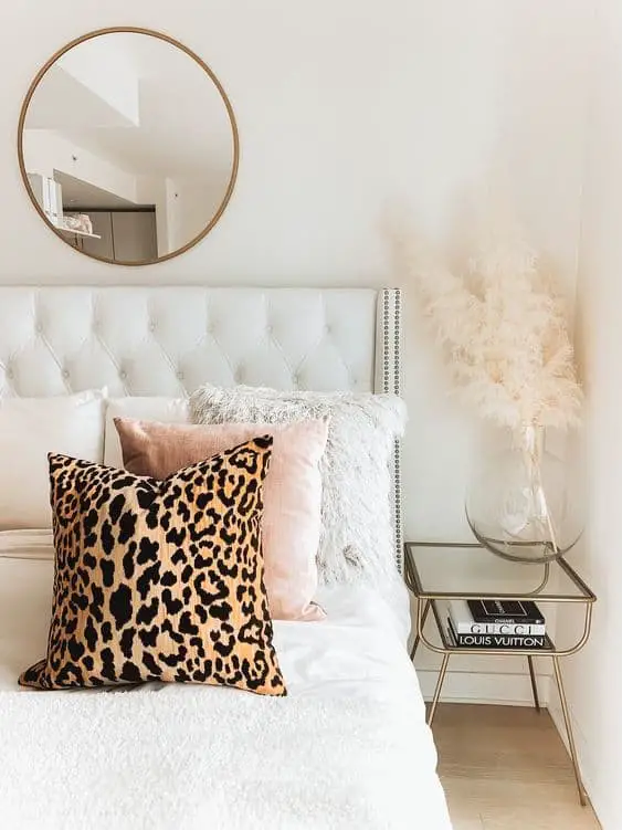 Soft pink and animal prints to your white and gold bedroom