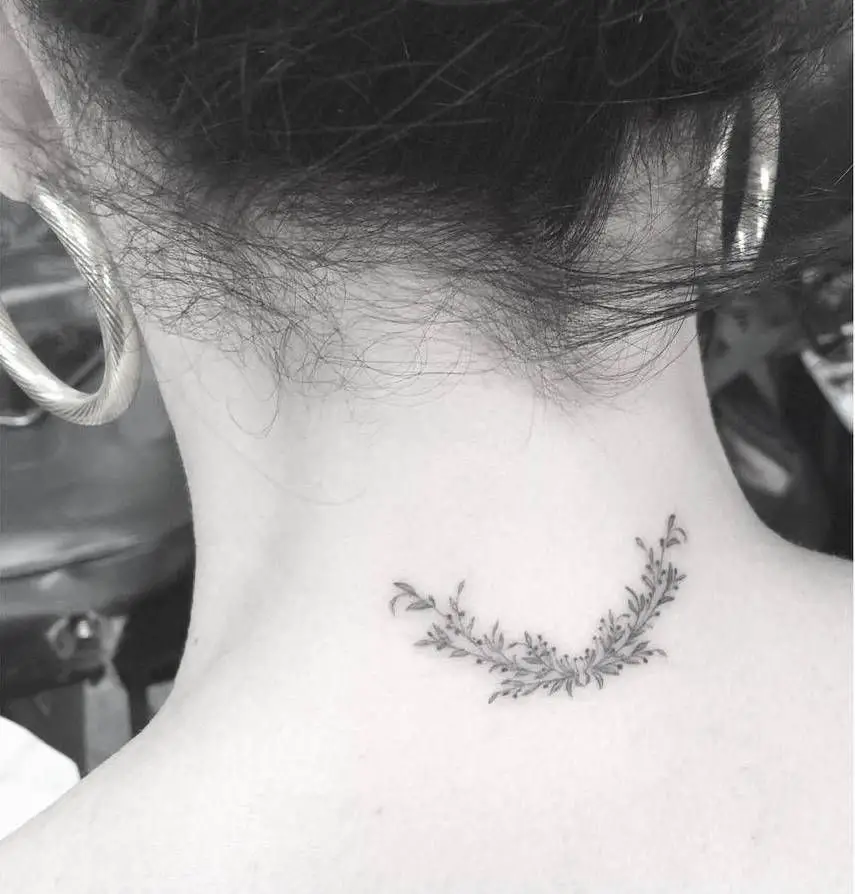 #10. The nape olive branch tattoo.