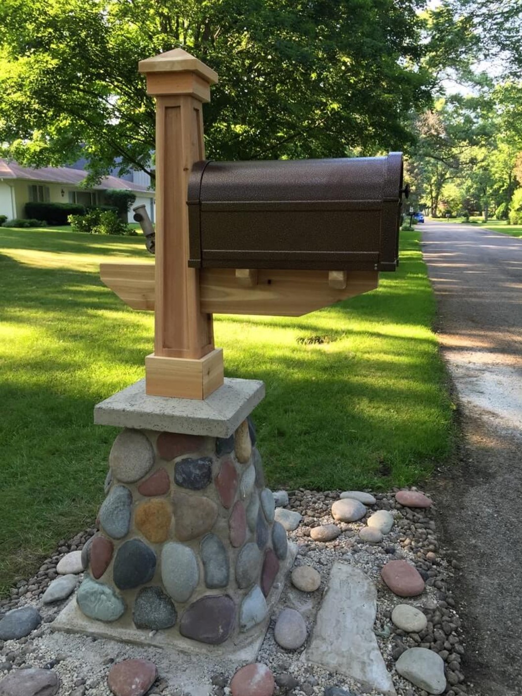 A mailbox with Masonry Base