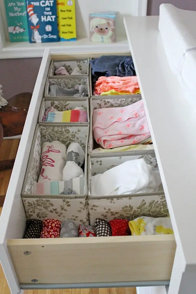 Use some boxes to organize baby clothes