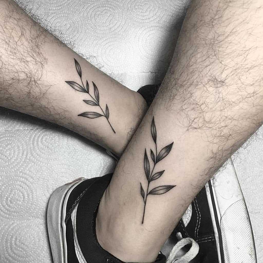 #7. The matching olive branch tattoo.