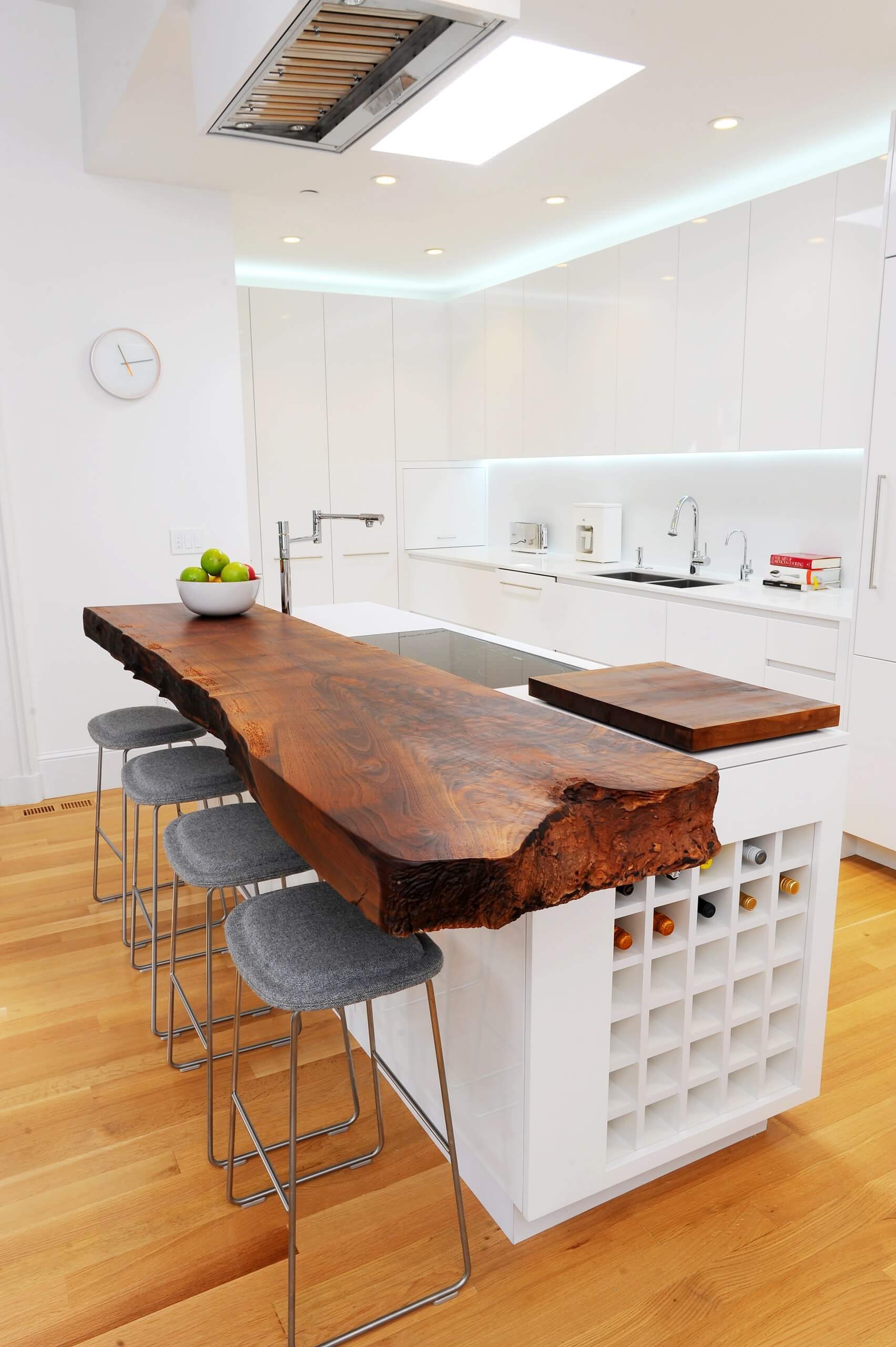 #13. Eclectic kitchen with white countertop and Bali wood slab