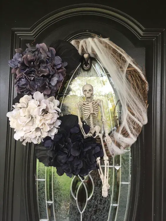 #7. Gothic wreath with mini skeleton