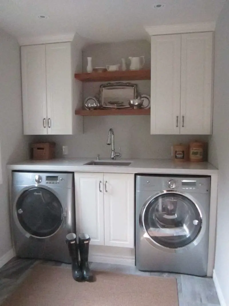 Laundry room ideas with sink between washer and dryer.