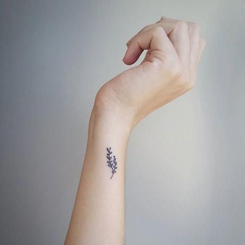 #4. The wrist olive branch tattoo.