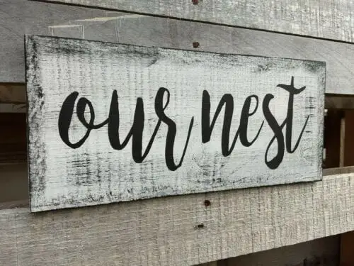 Rustic wooden ”Our Nest” sign