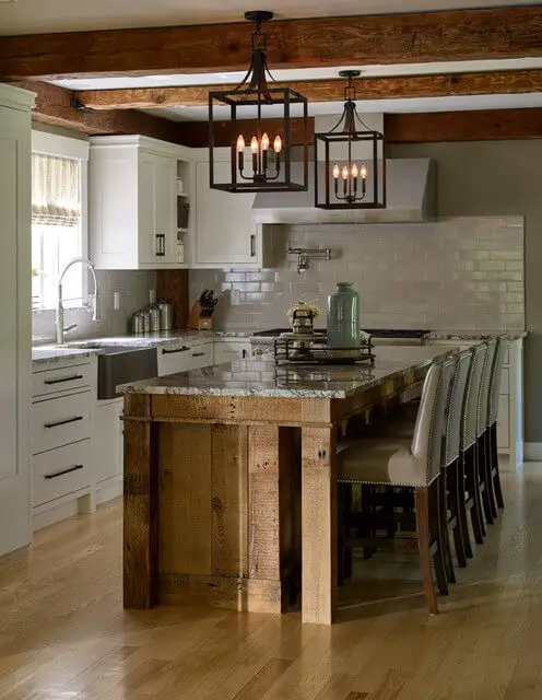 Modern farmhouse kitchen with white cabinets and granite countertops