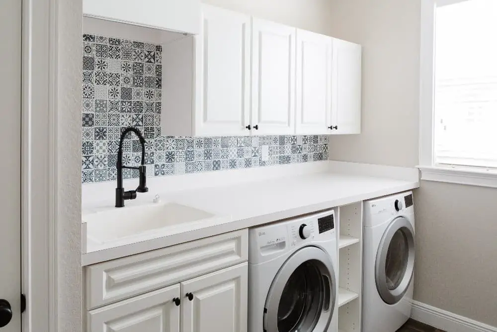 Laundry room sink backsplash ideas.